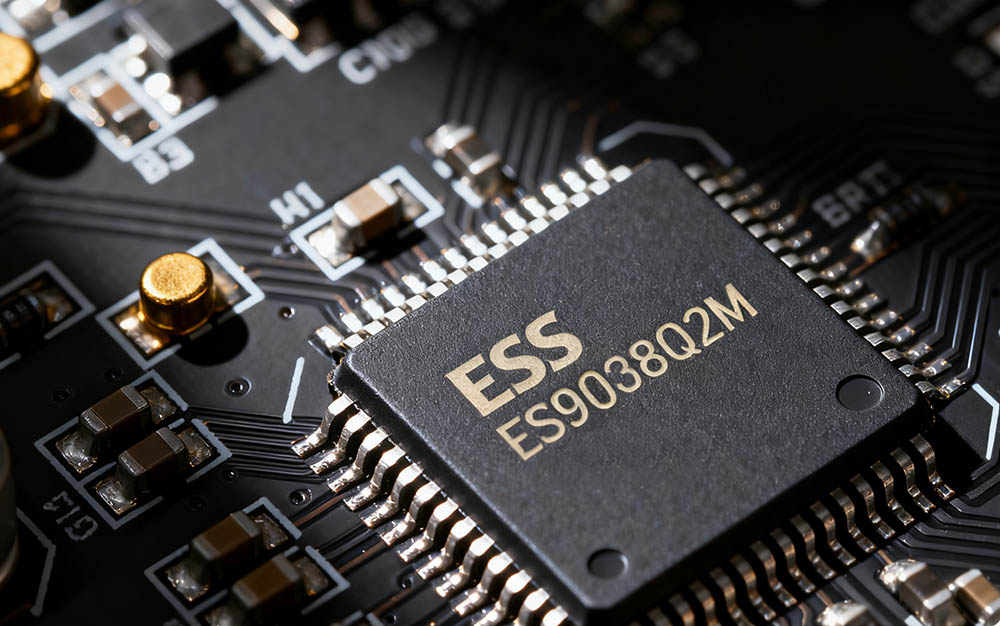 Close - up of ESS ES9038Q2M chip on circuit board, key component for high - fidelity audio in eweat.com's audio - video products